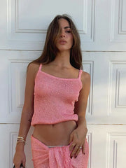 Haut rose pailleté à fines bretelles