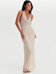 Robe de vacances à bretelles spaghetti, pois et décolleté asymétrique en V
