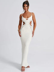 Robe moulante blanche à fines bretelles en maille ajourée