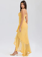 Robe longue moulante jaune à volants et drapée