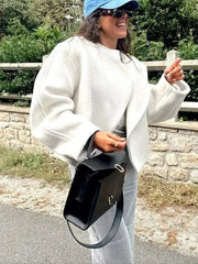 Élégant manteau court en laine à festons
