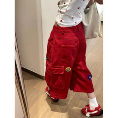 Pantalon en denim rouge à imprimé cœur
