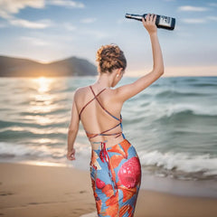 Robe de vacances à bretelles fines et à fleurs contrastées et perles