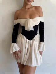 Robe moulante mini plissée évasée sans bretelles