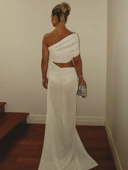 Robe de vacances moulante en maille ajourée et froncée