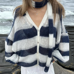 Gilet rayé à manches lanternes et boutons en maille