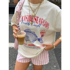 T-shirt oversize vintage en coton à motifs de fruits de mer