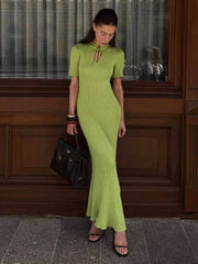 Robe maxi moulante à manches courtes et ajourée
