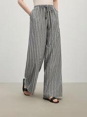 Pantalon rayé taille haute drapé