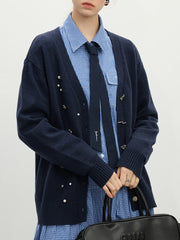 Gilet en laine bleu marine à col V et perles