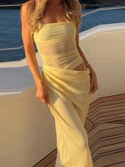 Robe midi moulante dos nu en maille