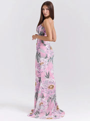 Robe de vacances rose à fleurs et fines bretelles spaghetti