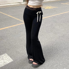 Pantalon de yoga à nœud et empiècements en dentelle