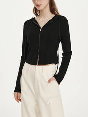 Gilet court à capuche en maille chevrons