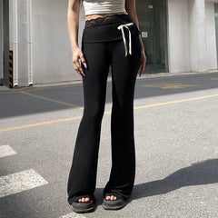 Pantalon de yoga à nœud et empiècements en dentelle