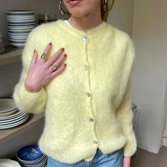 Gilet en maille bouffant à boutons ouverts sur le devant