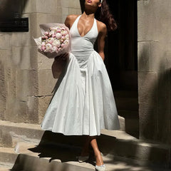Robe longue dos nu à décolleté plongeant et col halter