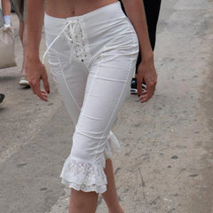 Pantalon Capri à volants en dentelle et nœuds croisés
