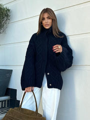 Gilet en maille à revers torsadés et boutons cachés