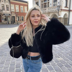 Manteau d'hiver court et duveteux en fausse fourrure