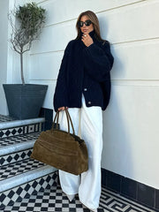 Gilet en maille à revers torsadés et boutons cachés