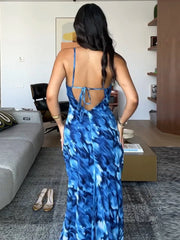 Robe de vacances bleue imprimée à dos nu et lacets