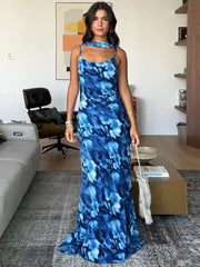 Robe de vacances bleue imprimée à dos nu et lacets