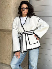 Manteau en maille patchwork à lacets