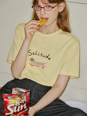 T-shirt imprimé en coton à manches tombantes