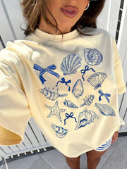 T-shirt à col ample avec nœud papillon conque océanique