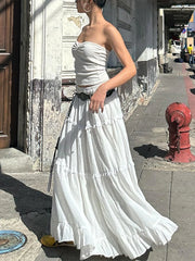 Jupe blanche fluide à volants et dentelle