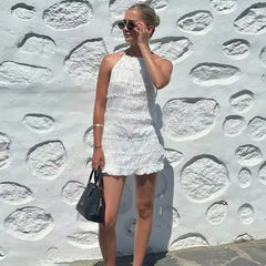 Robe mini plissée à lacets et dos nu