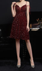 Robe midi à décolleté plongeant et sequins 
