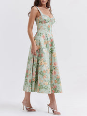 Robe midi dos nu à bretelles fines et décolleté fleuri