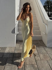 Robe midi jaune satinée dos nu à bretelles