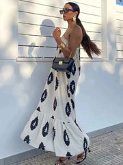 Robe midi asymétrique imprimée dos nu