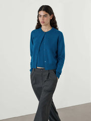 Cardigan court minimaliste à col rond en maille