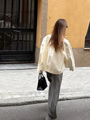 Manteau blanc à manches longues et fermeture éclair