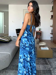 Robe de vacances bleue imprimée à dos nu et lacets