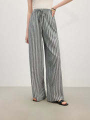 Pantalon rayé taille haute drapé