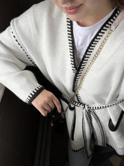 Manteau en maille patchwork à lacets