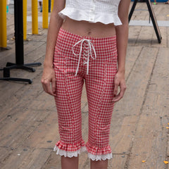 Pantalon Capri à volants en dentelle et nœuds croisés