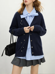 Gilet en laine bleu marine à col V et perles