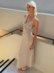 Robe de vacances à bretelles spaghetti, pois et décolleté asymétrique en V