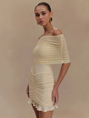 Robe moulante mini bustier à volants en résille