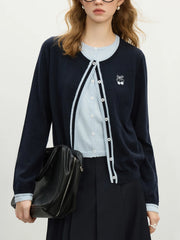 Cardigan élégant en laine brodée et tricotée