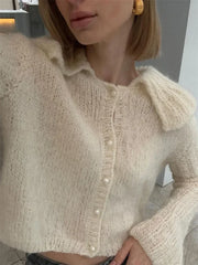Manteau court à manches évasées plissées