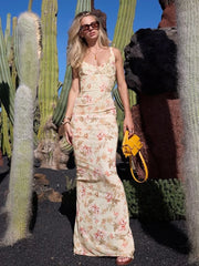 Robe longue à bretelles et fente florale décolletée