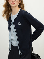 Cardigan élégant en laine brodée et tricotée