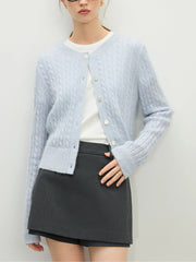 Cardigan bleu en soie à col rond orné de perles